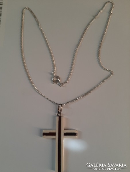 Bone ebony cross on a silver chain!