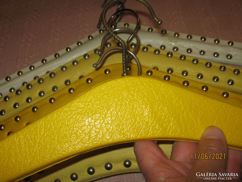 Faux leather hanger with 6 rivets
