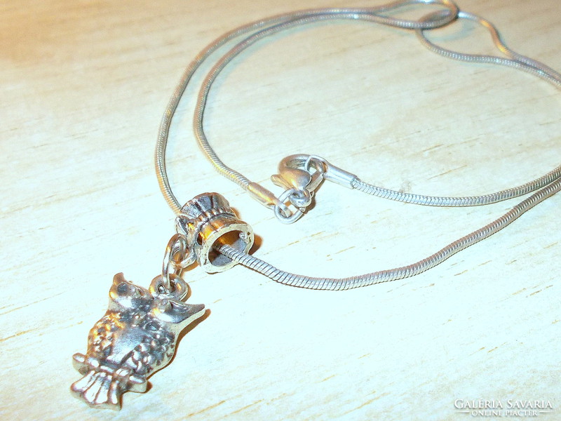 Antique owl with Tibetan silver necklace with ornate hanger