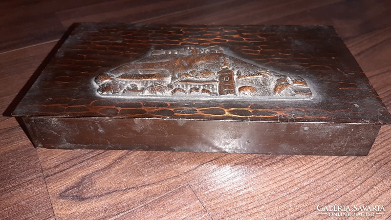 Wooden box with metal embossing motif