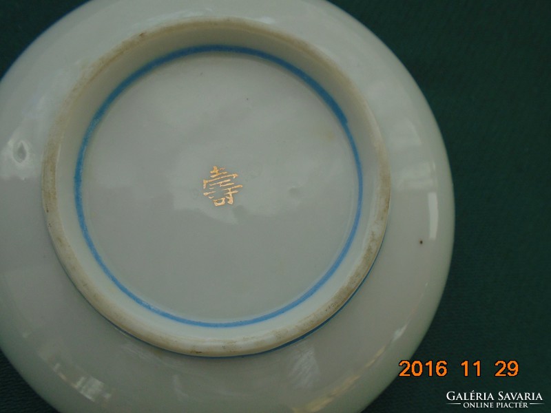 Antique arita aoki bowl with gold contoured high mountain landscape