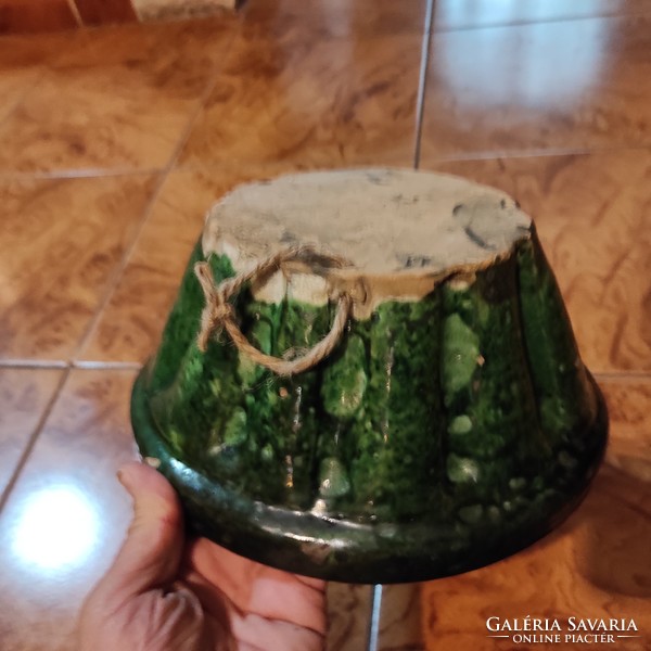 Beautiful antique green glazed dumpling oven shape. Folk tile pottery