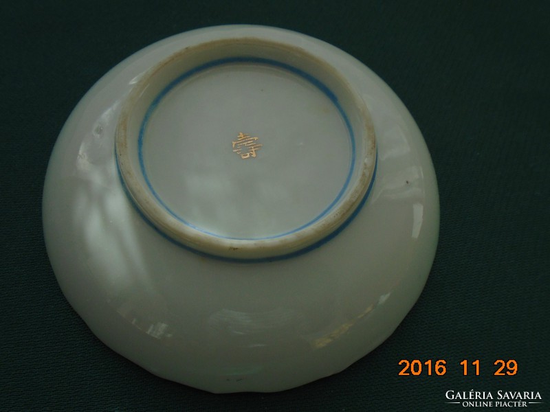 Antique arita aoki bowl with gold contoured high mountain landscape