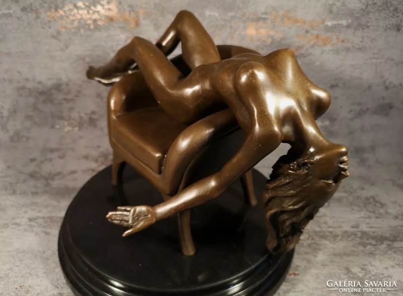 Sitting female act - bronze sculpture