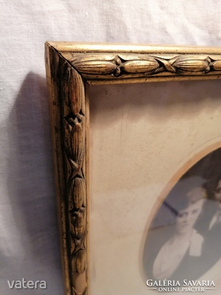 Old family photo in nice condition (then 100 years old) in a wooden blonde frame for cheap sale!