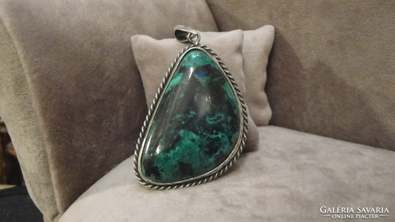 Silver pendant with turquoise stone