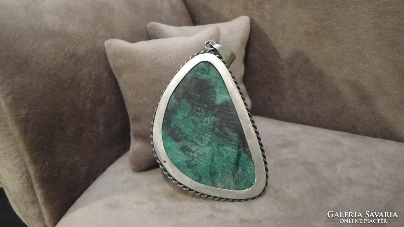 Silver pendant with turquoise stone