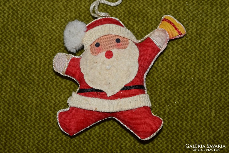 Old retro Christmas tree decoration textile Santa Claus for Christmas, New Year festive decoration
