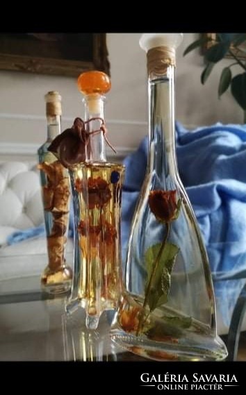 Old handcrafted bath oils in decorative bottles. 25 X 10 cm