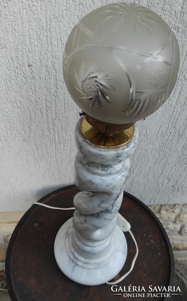 Twisted pierced marble lamp, polished glass bulb