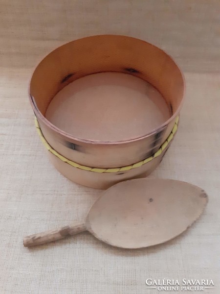 Old kitchen wooden framed flour sieve with floured wooden spoon