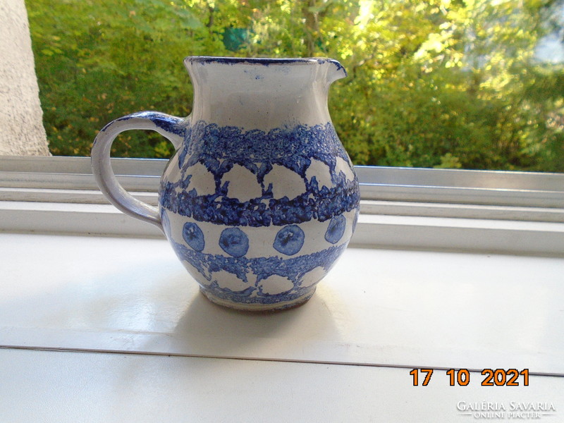 Lead glazed hand painted blue and white ceramic jug