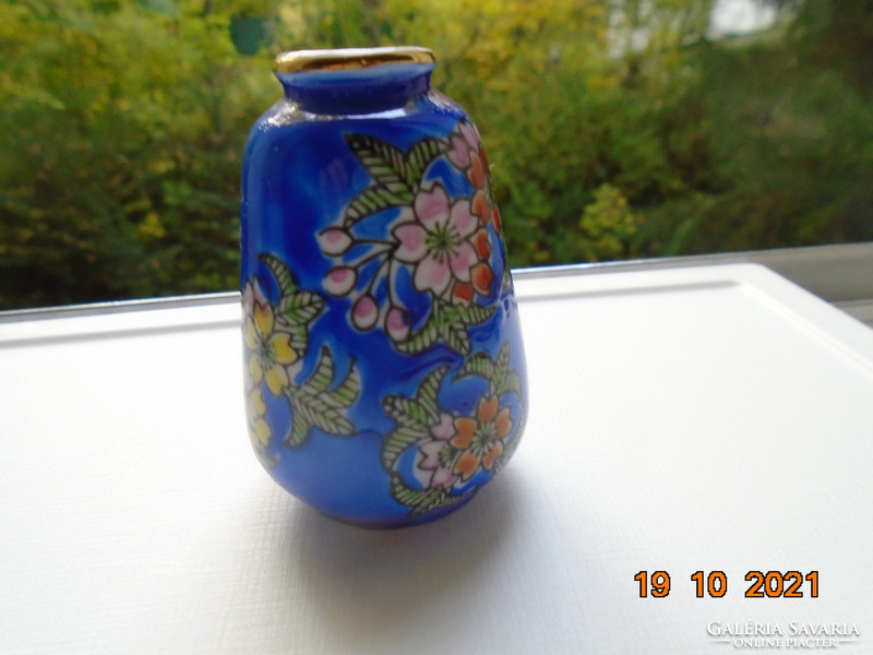 Small royal blue Chinese vase with hand painted colorful floral patterns