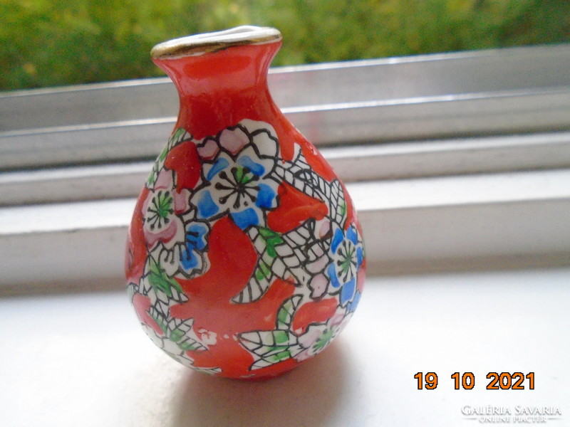 Small painted coral red Chinese vase with hand painted colorful floral patterns