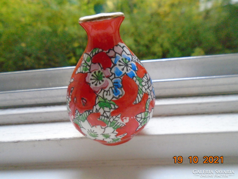 Small painted coral red Chinese vase with hand painted colorful floral patterns