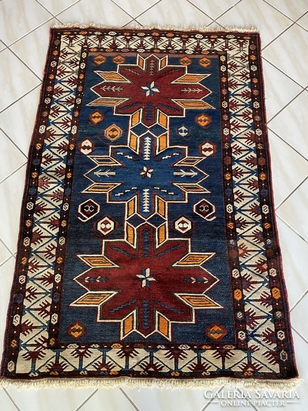 Antique Caucasian Kazakh rug 110x170