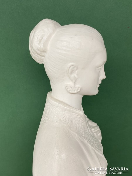 Large biscuit porcelain statue of a standing woman by sculptor Kristóf Kelemen - cz