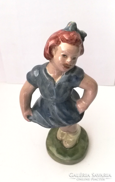 Old ceramic little girl figurine with nipple