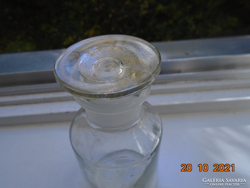 Marked pharmacy glass with polished solid glass stopper