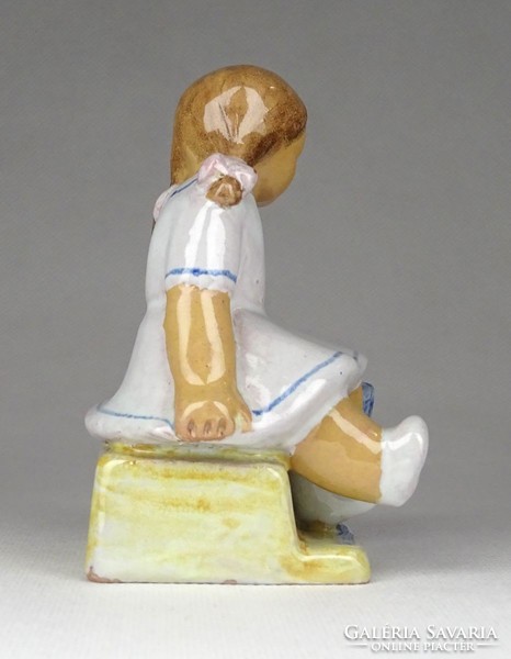 1G330 baby rocking marked little girl ceramic figurine