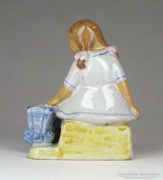 1G330 baby rocking marked little girl ceramic figurine