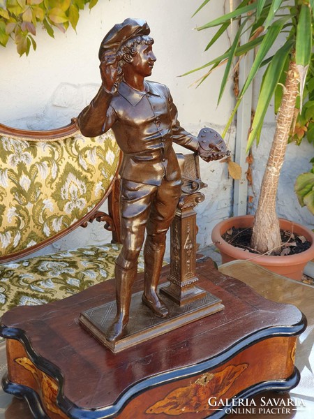 Old sculpture with inlaid wooden box base