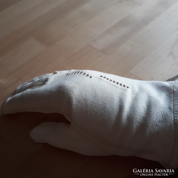 Vintage women's leather gloves on white