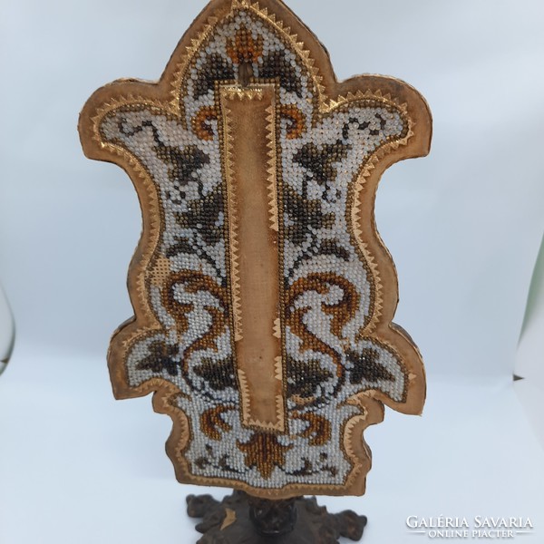 Beaded work on a metal stand
