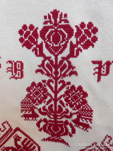 Embroidered tapestry.