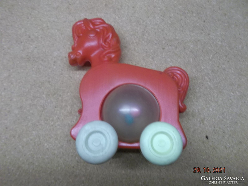 Old children's toy - pullable plastic horse --- 1 ---