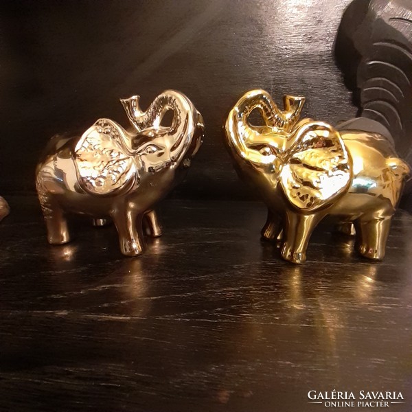 Modern elephant figurines in pairs
