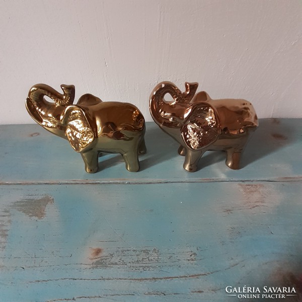 Modern elephant figurines in pairs