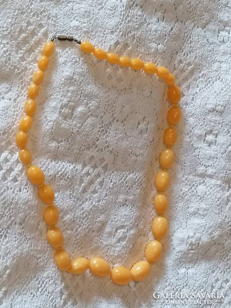 Retro perhaps vinyl necklace with yellow eyes 42.