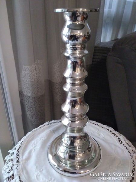Silver colored candle holder