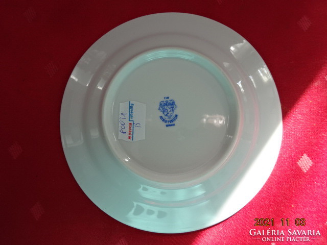 Lowland porcelain teacup placemat, cobalt blue. He has!