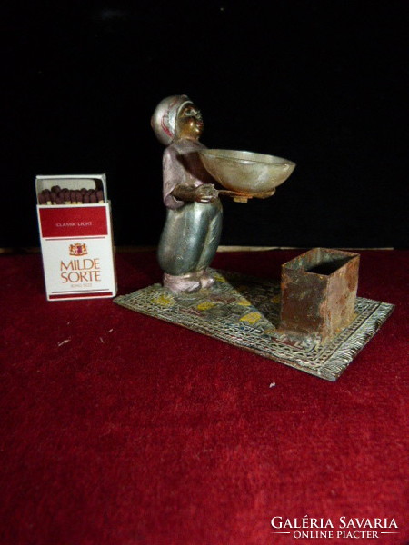 Old bronze / copper / shell nutmeg figurine.