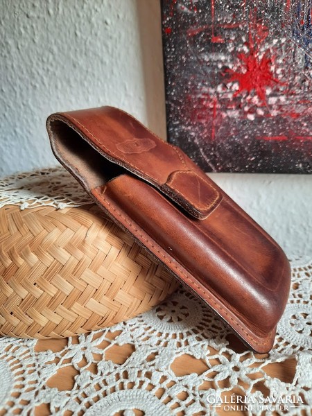 It can be a leather retro pen holder or even a glasses holder.