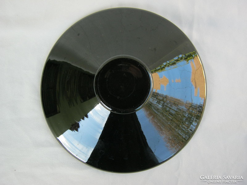 Retro ... Black glass bowl with colorful patterns as a table centerpiece