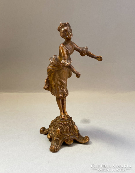 Gilded tin dancer statuette.