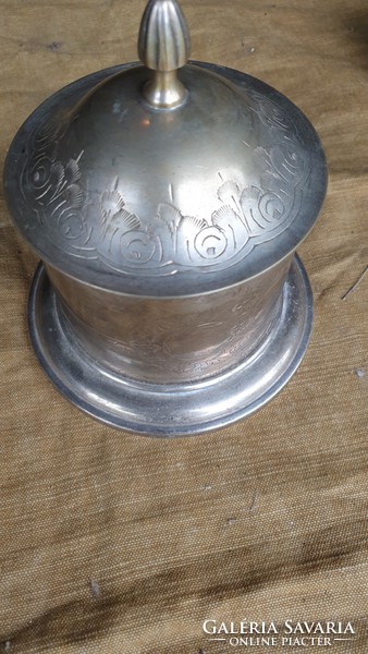 Artistic engraved holder