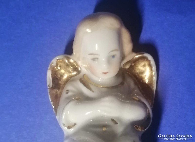 Collector of old german marked porcelain angel