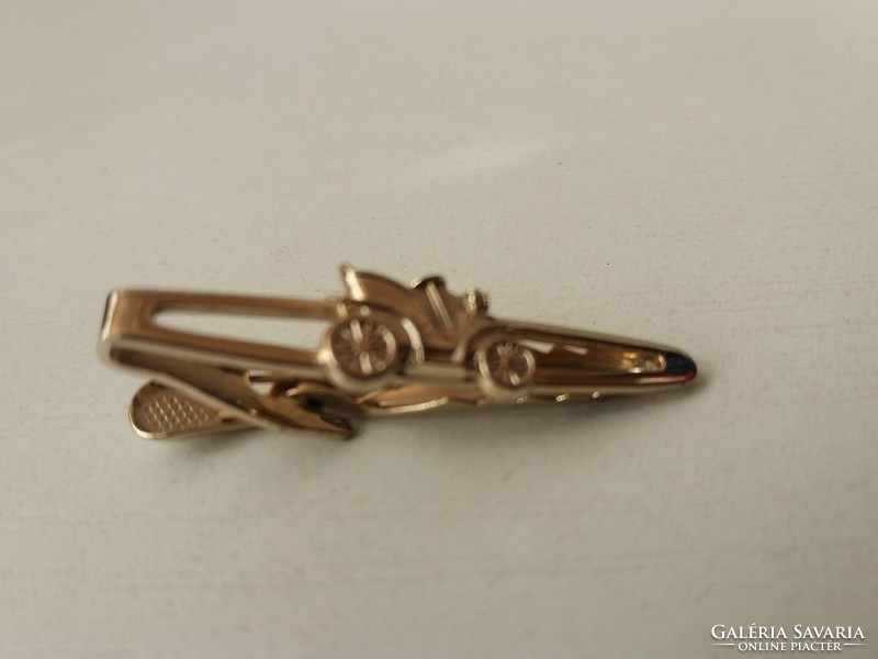 Marked English gilded tie tweezers with old car decoration