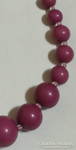 Plastic beaded necklace.