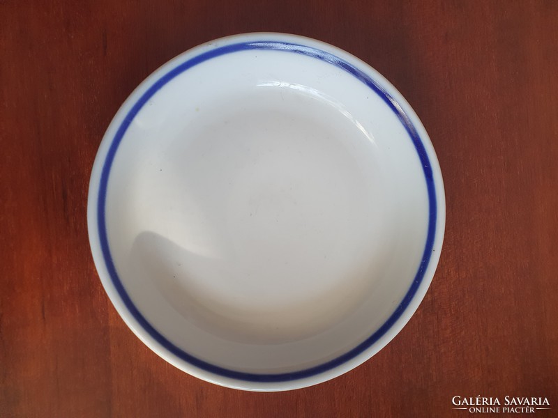 Porcelain cup bottom marked Zsolnay, with a cobalt blue stripe