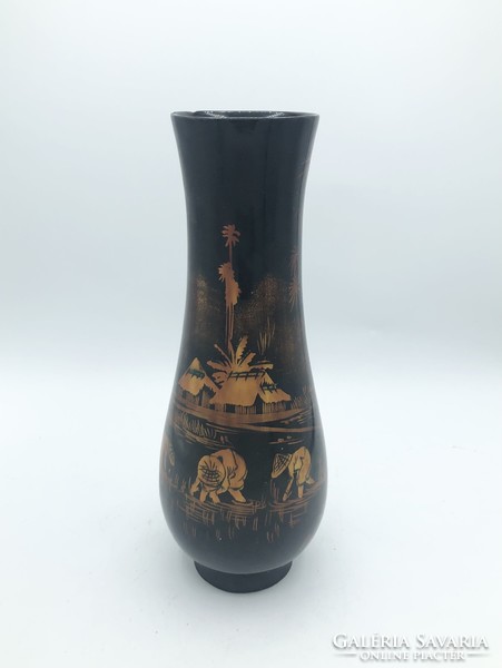 Old oriental wooden lacquer vase