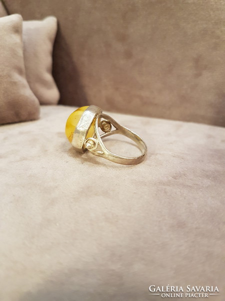 Silver ring with polish honey amber