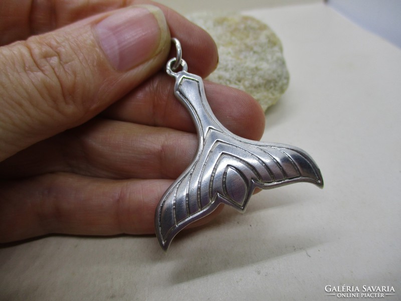 Beautiful craftsman with silver pendant