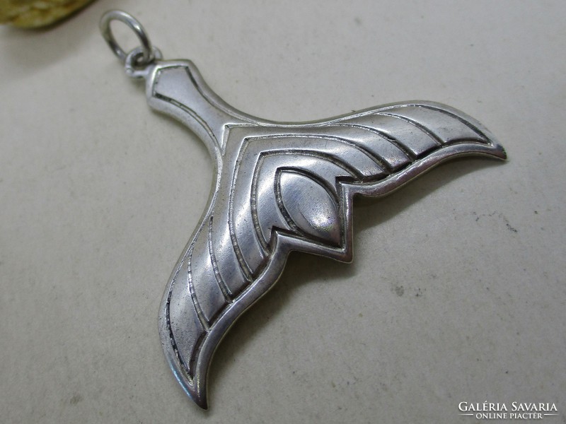 Beautiful craftsman with silver pendant