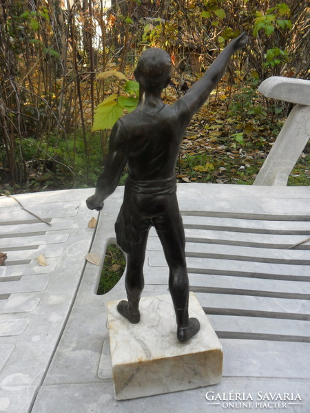 Bronze tin man statue