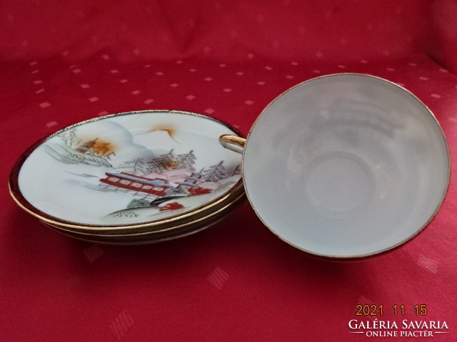 Japanese porcelain teacup + placemat, the cup is transparent. He has!